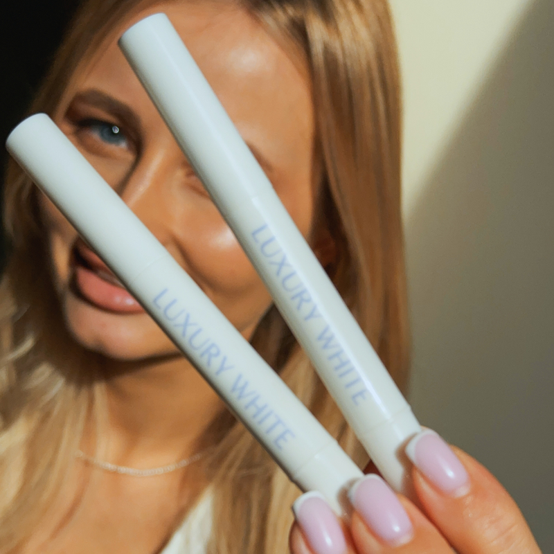 Woman-With-Whitening-Pen